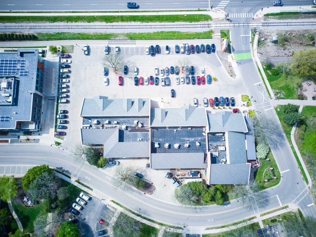 Commercial real estate drone photography with parcel boundary lines for an industrial warehouse in Rockford Illinois